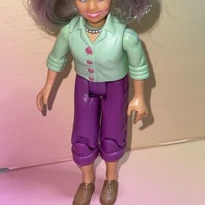 Stylish Doll with Green Top and Purple Pants